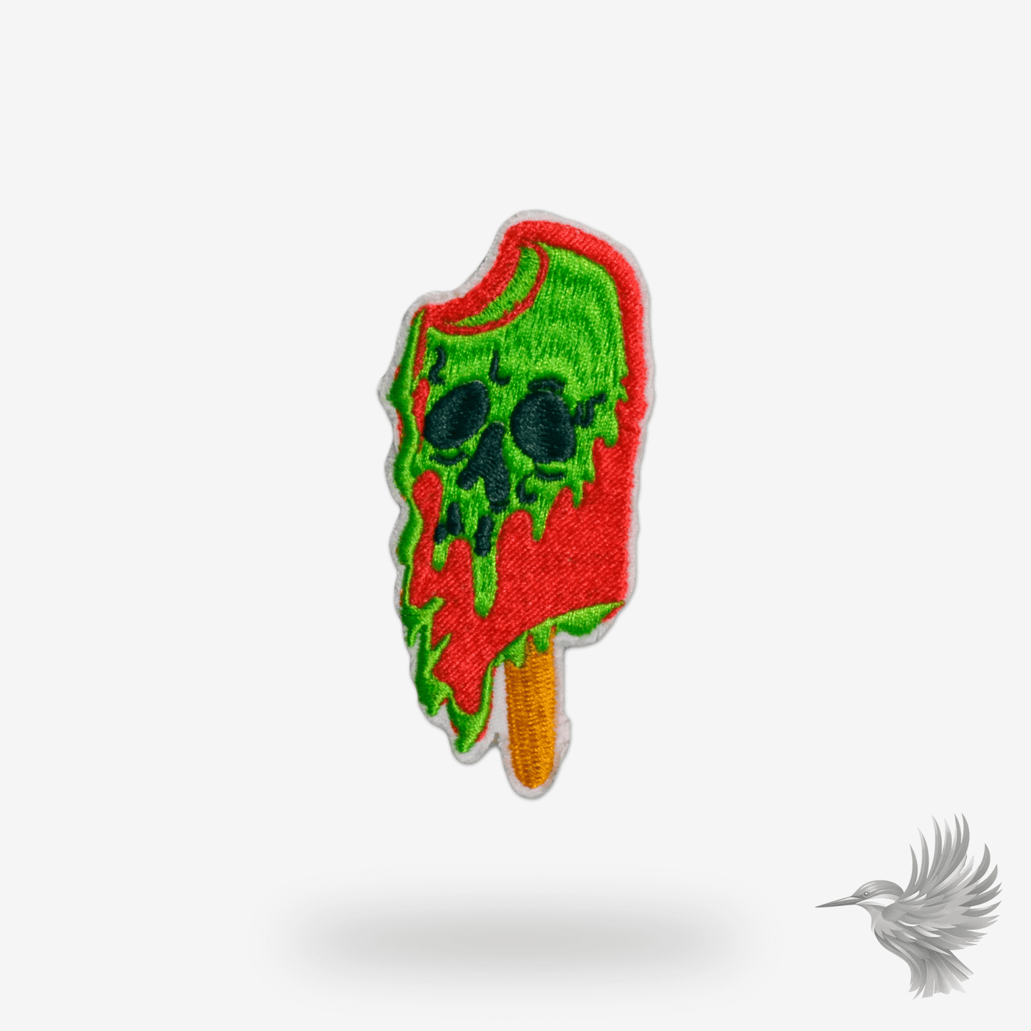 Zombie IS iron-on patch featuring a green and red zombie ice pop design with a skull motif.