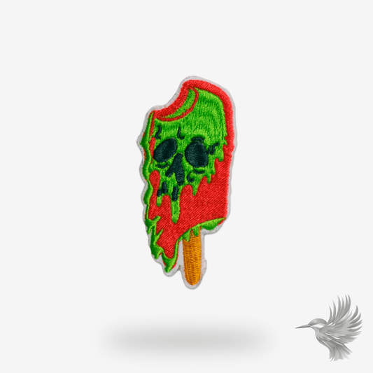 Zombie IS iron-on patch featuring a green and red zombie ice pop design with a skull motif.