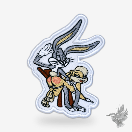 Snurre snup stofmærke med legende motiv – perfekt til tøj eller tasker.