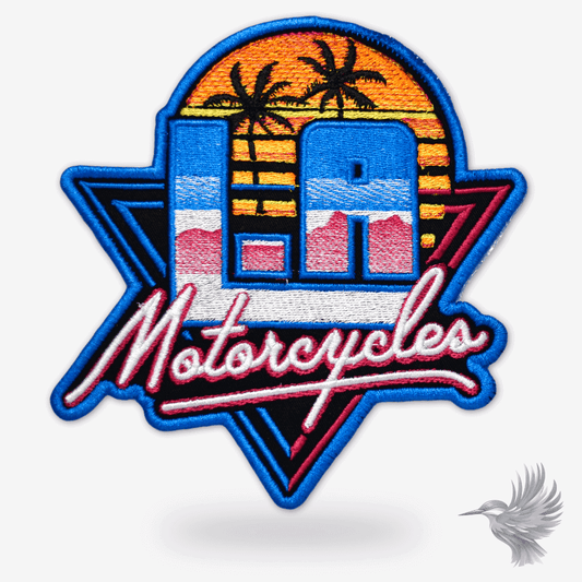 LA Motorcycles retro biker patch with colorful retro design and palm trees, capturing California's vibe.