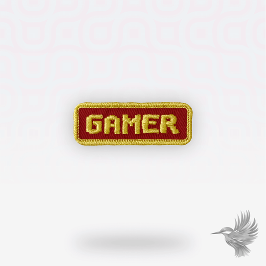 Gamer strygemærke – broderet patch i rød og guld med ordet GAMER til jakker, hoodies, caps og streetwear.