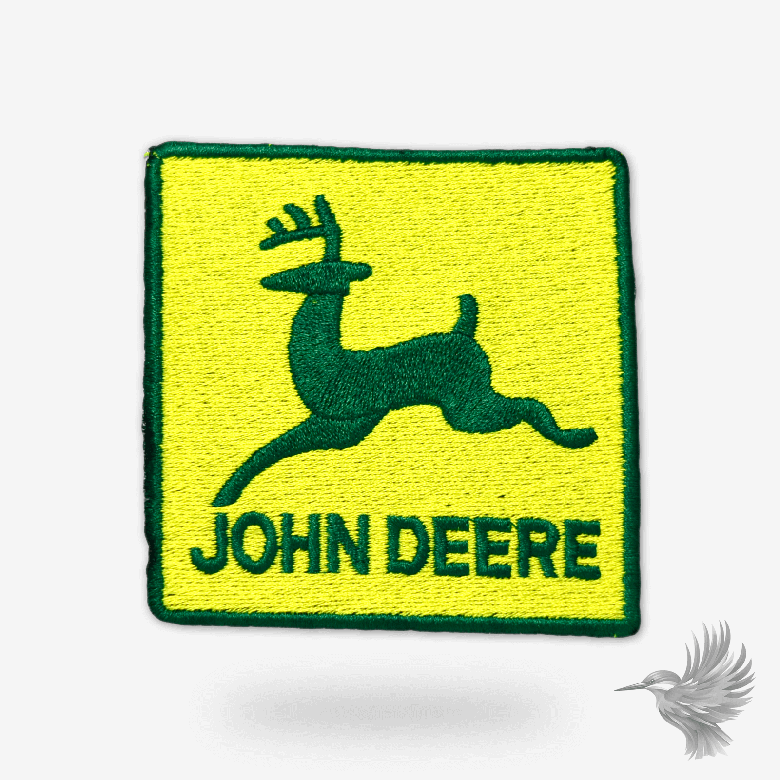 John Deere patch featuring the iconic green and yellow logo symbolizing strength and tradition.