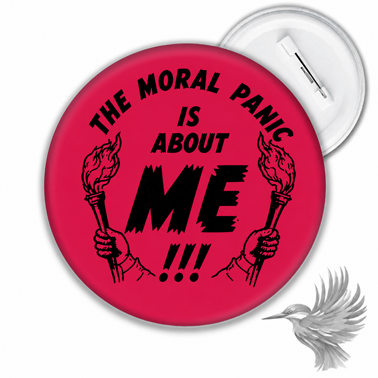 Moral Panic Badge med pink baggrund og sort tekst "THE MORAL PANIC IS ABOUT ME!!!" med hænder, der holder fakler.
